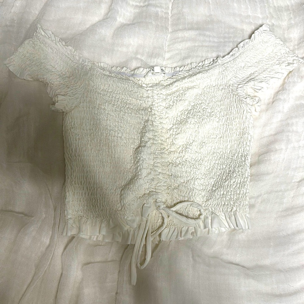 white cropped shirt with a ribbed material
